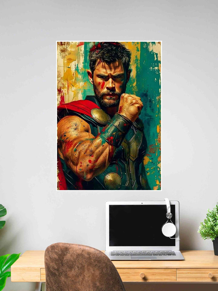 Poster of Thor in a battle stance with red cape, vibrant brushstroke background, and bold superhero armor, displayed above a desk setup.