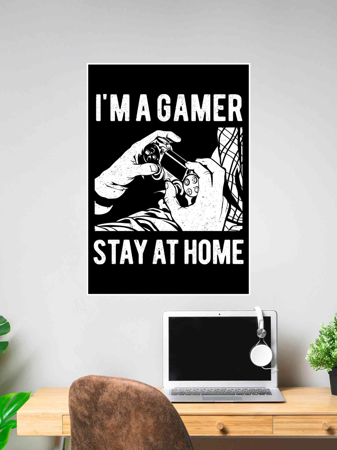 Black and white poster with gamer hands holding a controller and the text “I’m a Gamer Stay at Home.”