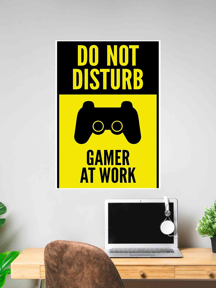 Poster with bold yellow and black design reading “Do Not Disturb – Gamer at Work” with a game controller icon.