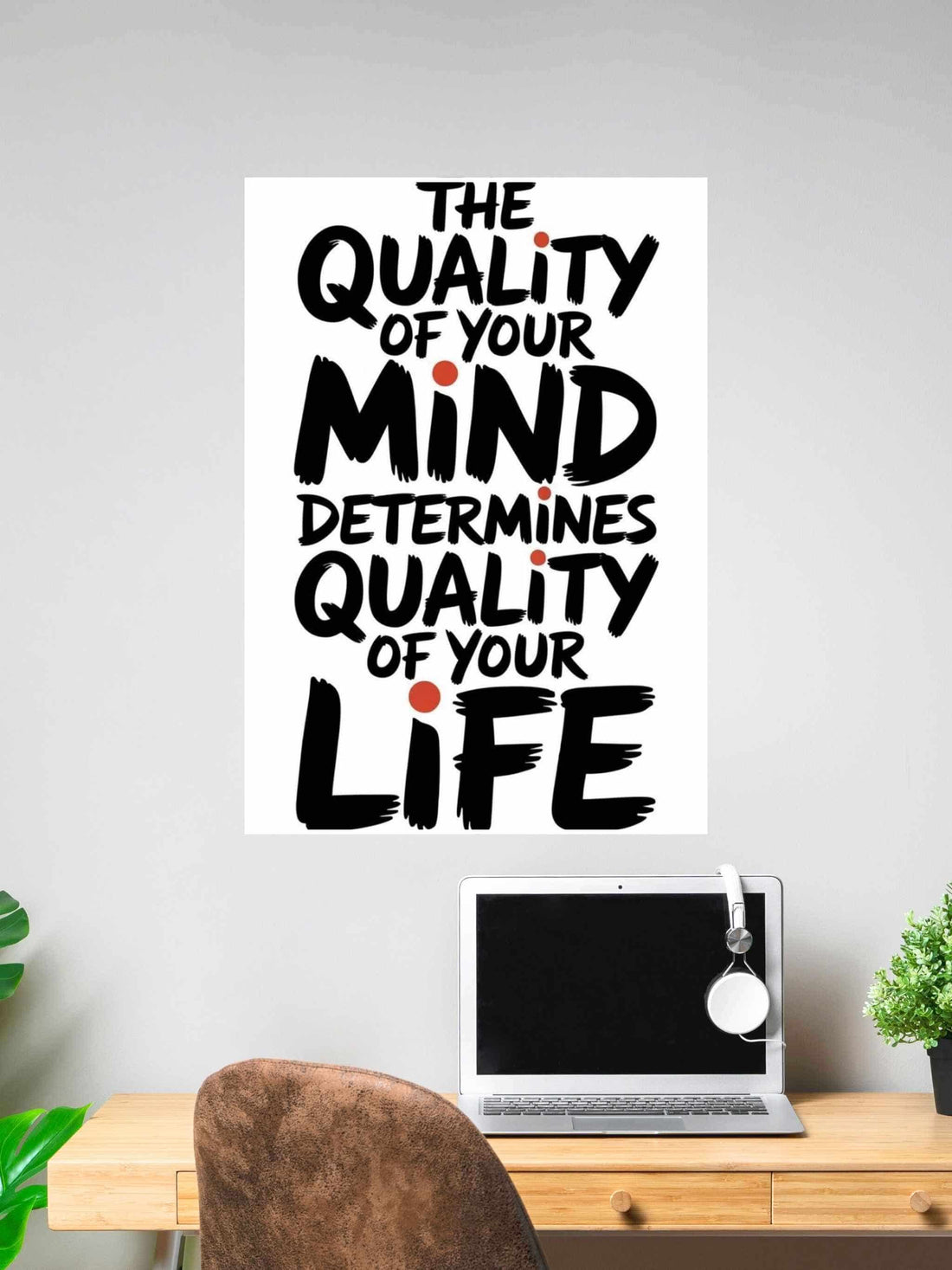 Typography wall art with the quote “The quality of your mind determines the quality of your life” in bold black text with red dots.