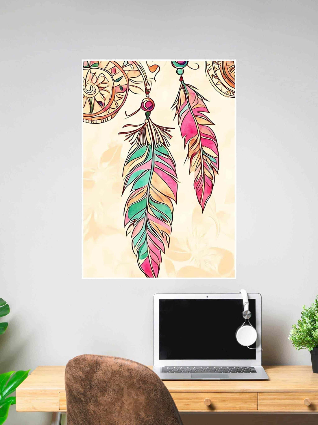 Bohemian feather and dreamcatcher wall art in pastel pink, green, and orange.