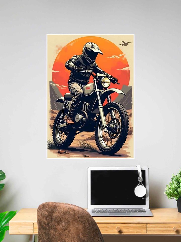 Illustrated poster of a Yamaha dirt bike rider in gear, set against a retro-style sunset and desert landscape with mountains and a flying bird.