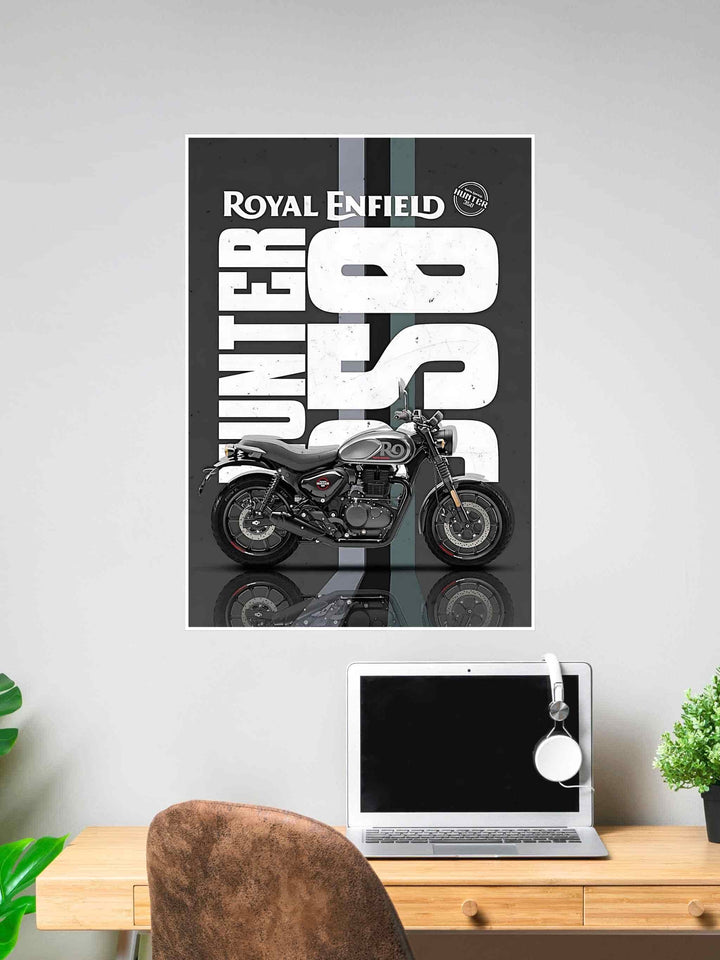 Royal Enfield Hunter 350 motorcycle with bold vertical text background and reflection effect on dark surface.