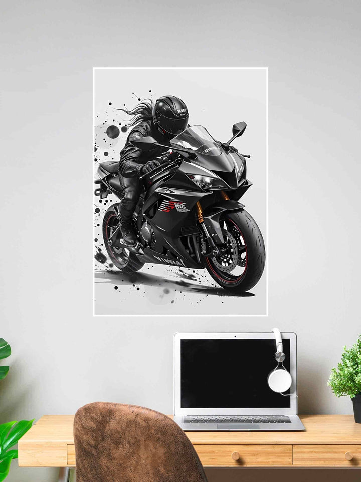 Motorcyclist riding a Yamaha R6 sportbike in full black gear with a dynamic splash background.