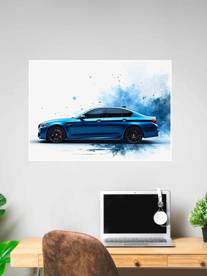 Side view of a blue BMW M-Series with a blue watercolor splash background, displayed as a wall poster above a desk setup.