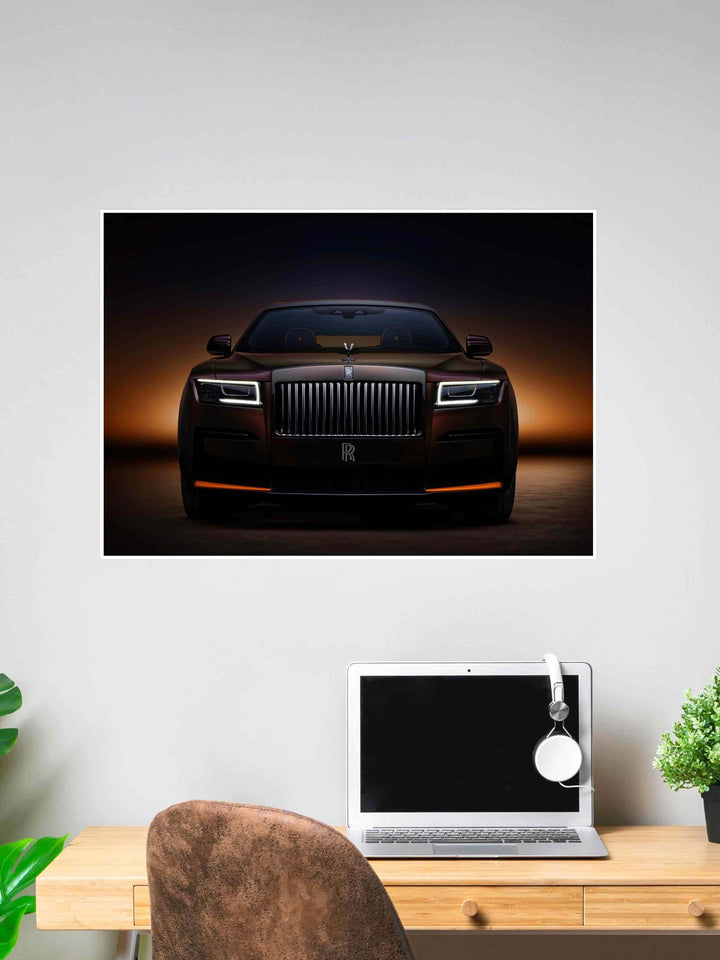 Poster of a brown Rolls-Royce car with orange accents, front-facing under a moody gradient background transitioning from orange to dark purple.